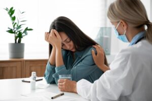 a doctor giving therapy to depresed girl